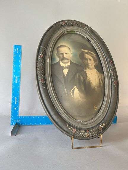 Oval bubble glass frame with yer long lost relatives 17 x 25 image