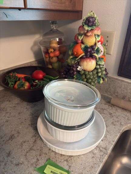 Various fruit decor and three casserole dishes image