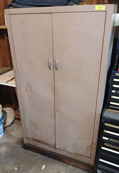 2 door metal storage cabinet 18 x 36 x 63H and contents-gas cans, 2 cycle oil, funnels, lubricants, grease gun and more image