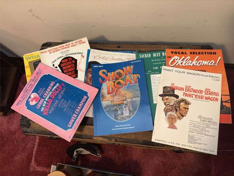 Sheet music and variety of music books, music stand