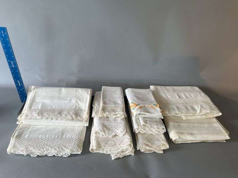 Hand crocheted edge bed linens, 5 sets of pillows cases and one single image