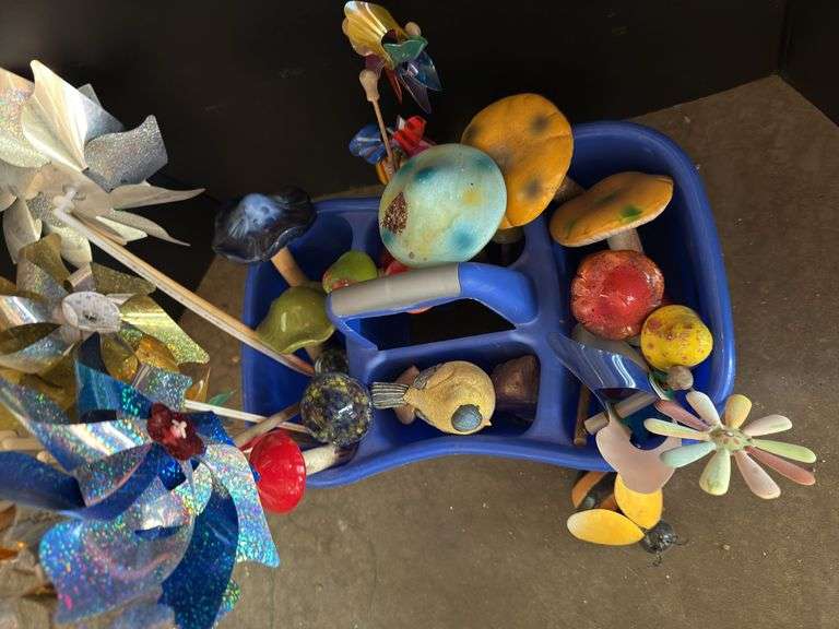 Cleaning caddy of ceramic mushrooms and wind spinners
