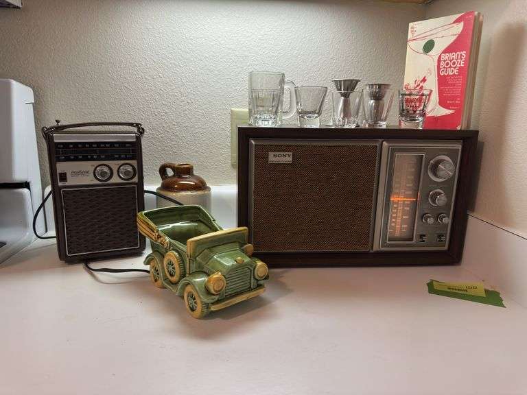 Sony radio, bar guide, car planter,  shot glasses, etc