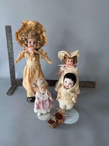 Four bisque dolls image