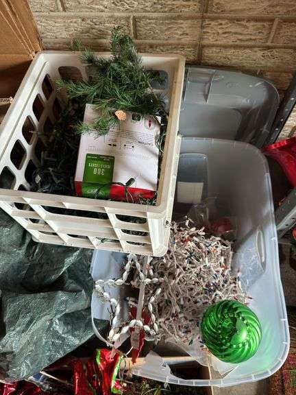 Christmas tree in bag, wreathes, lights, etc