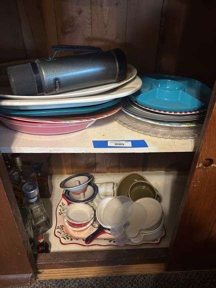 Assorted trays, plastic and ceramic and ceramic bowls plus Aladdin thermos image