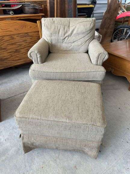 Overstuffed chair and ottoman image