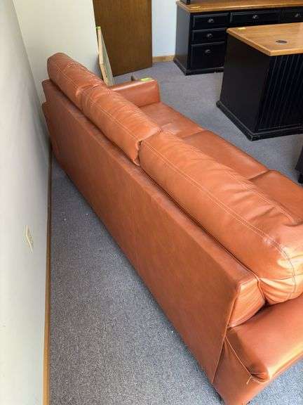 82” long Ashley three cushion sofa