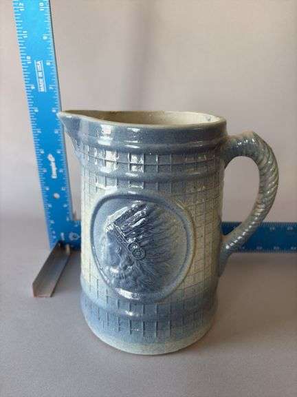Blue and white pottery, 8” tall, Indian with headdress on front and back image
