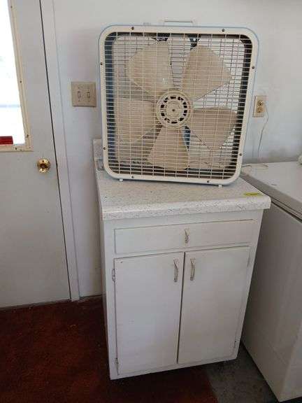 24" wooden base cabinet and box fan