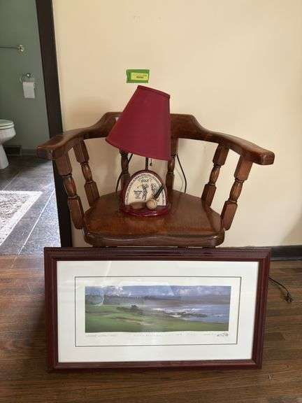 Captains chair, “Origins of Golf” table lamp and framed “Pebble Beach Golf Links No.8" image