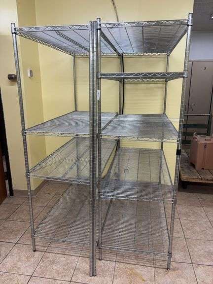 Two storage racks (hooked together), two extra poles, shelves are 24” deep, 54 long image