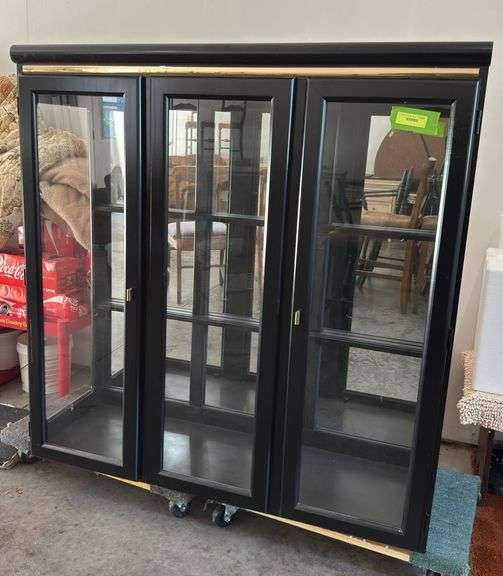 Lighted black hutch top with glass shelves 17D x 48L x 50H Glass shelves are wrapped in house