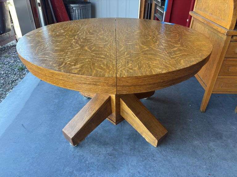 Antique Tiger oak dining table on casters 4’ image