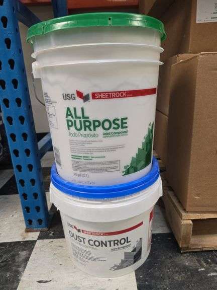 2 buckets of joint compound image