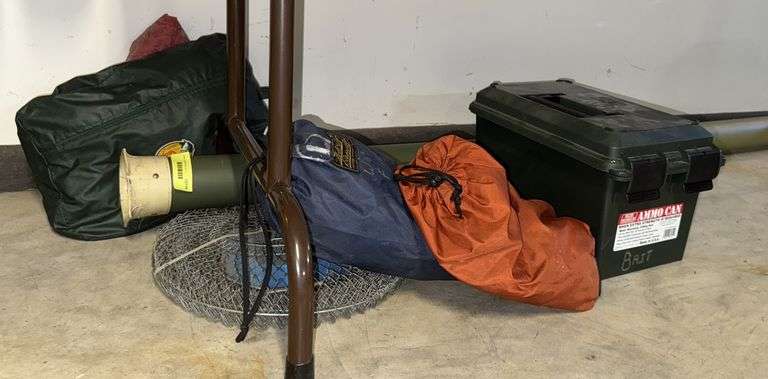 Rod case, rain suit, poncho, large ammo can with bait, fish basket image