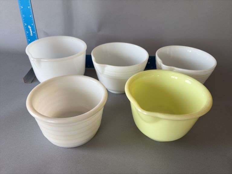 Five mixer bowls including pale yellow Hamilton Beach bowl image