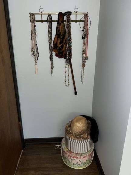 Costume jewelry, walking stick, women’s hats and hat boxes image