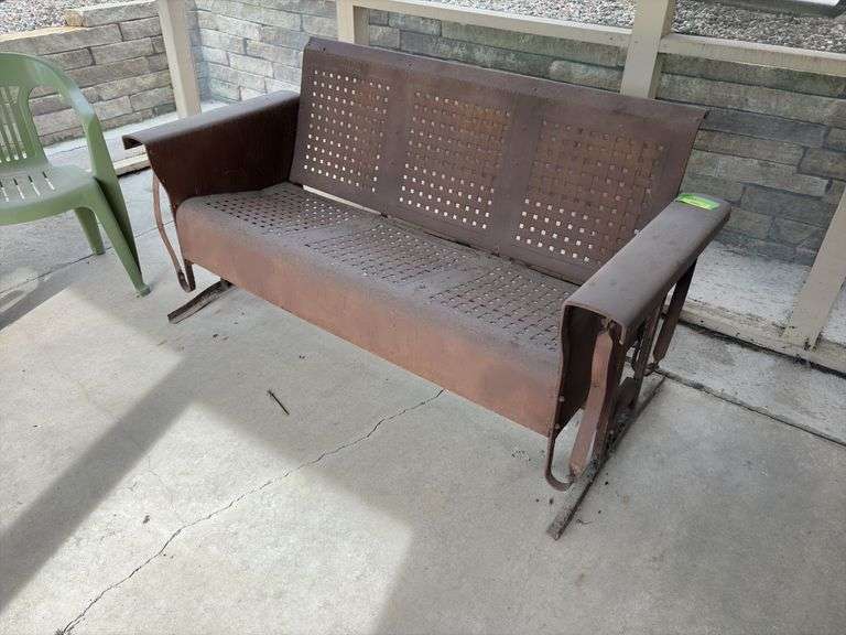 Vintage metal patio glider 56" wide. A classic!