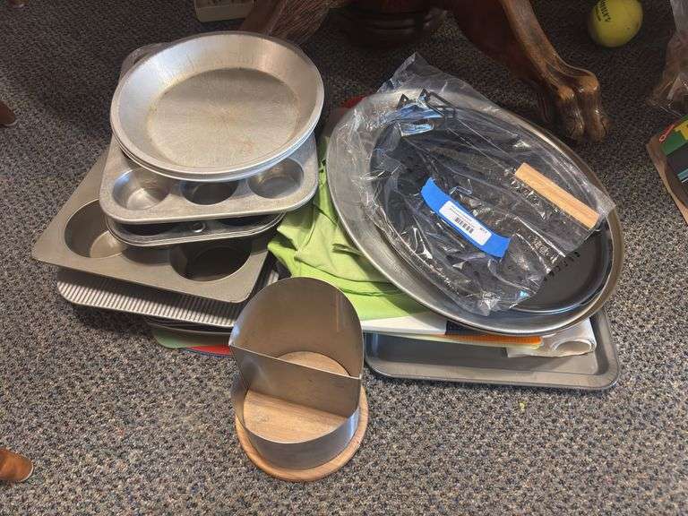 Assorted baking sheets, pizza pans, muffin pans, cutting boards image