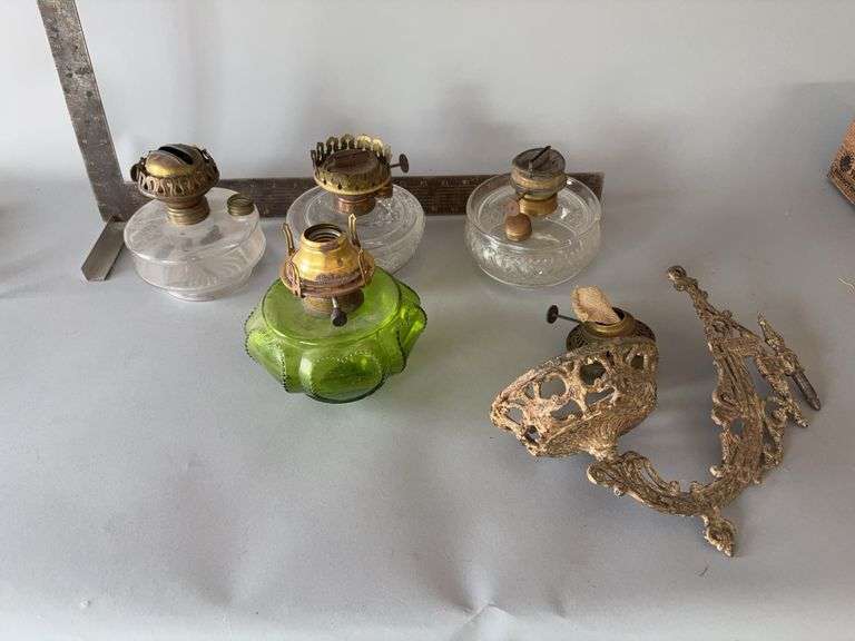 Four lamp fonts and partial cast iron wall mount image