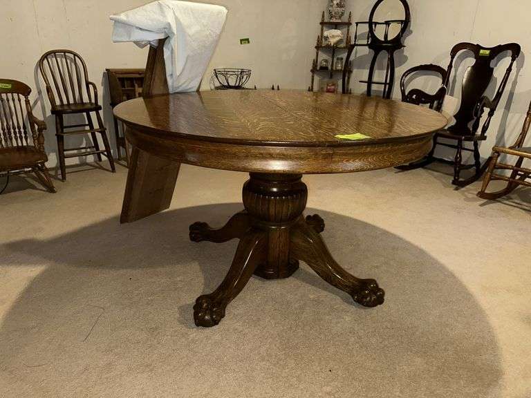 48” round oak table w/ (2) 12" leaves