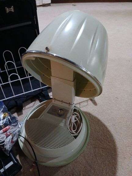 Luggage, retro hairdryer, landline phone, fish bowl, shoe rack, etc