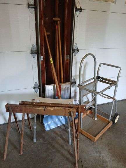 Snow shovels, shower chair, saw horses, rolling cart etc... image