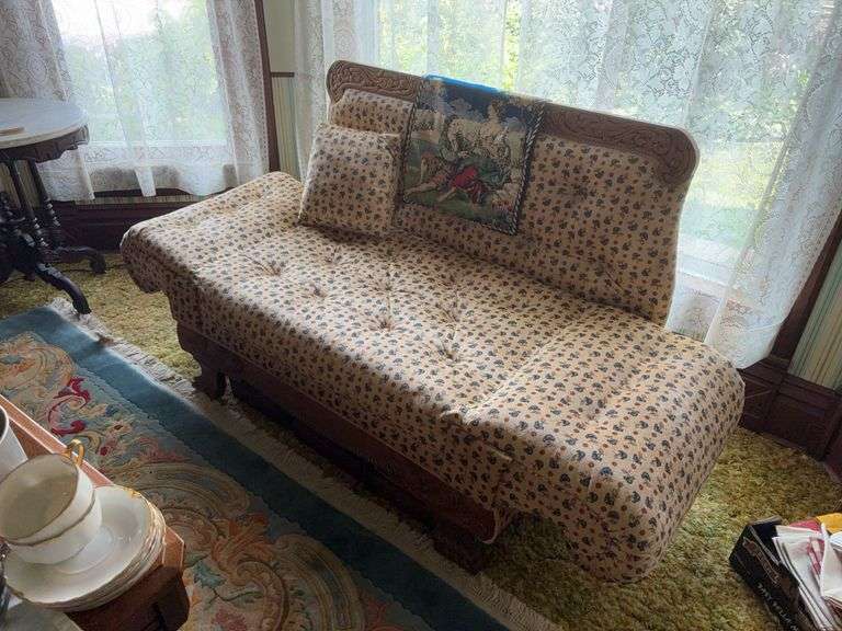 60” settee with oak trim on wooden wheels image