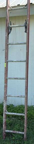 8’ straight ladder & items on floor image