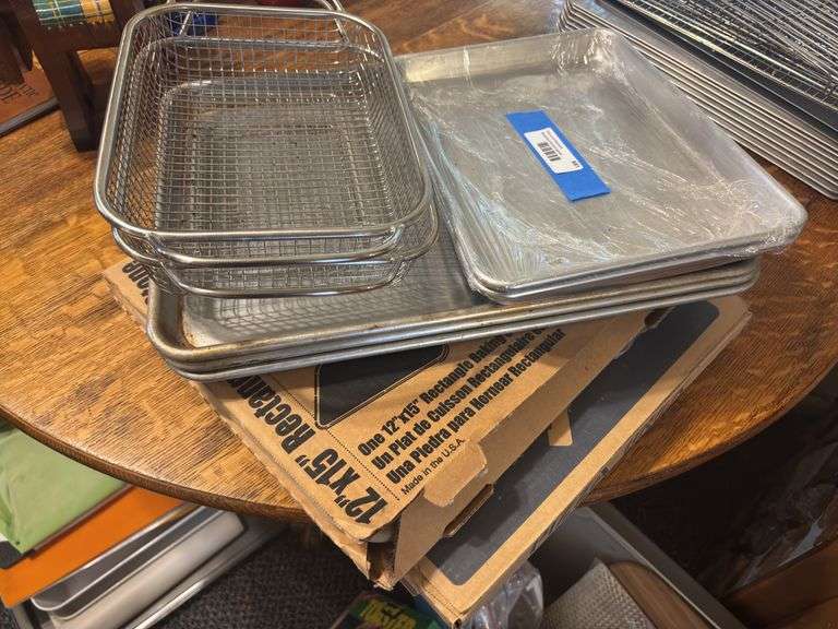 Two baking stones 3 half sheets and two 1/4 sheets plus 2 metal baskets image