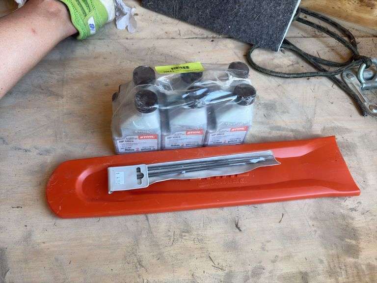 Stihl chainsaw cover, files and oil image