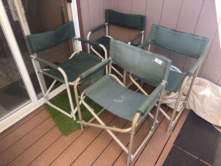 Four fold up frame style camp chairs image