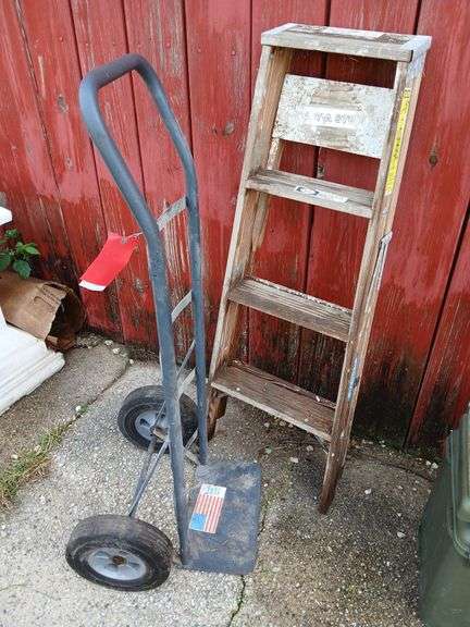 2 wheel hand truck and 4' step ladder image