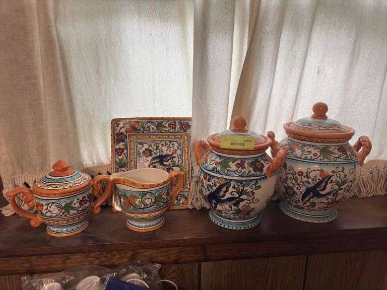 Decorative ceramic canisters with matching cream & sugar image