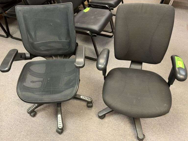 Two non matching adjustable height office chairs image