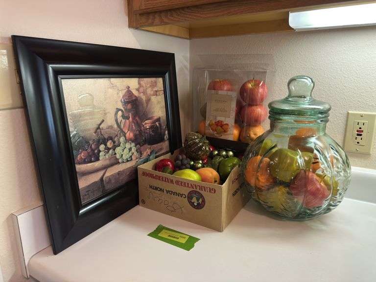 Artificial fruit, real picture and large jar