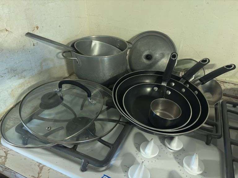 Set of three nonstick skillets and additional cookware image