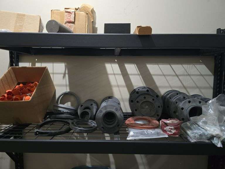 PVC flange fittings, seals, bolts etc and box of rebar caps image
