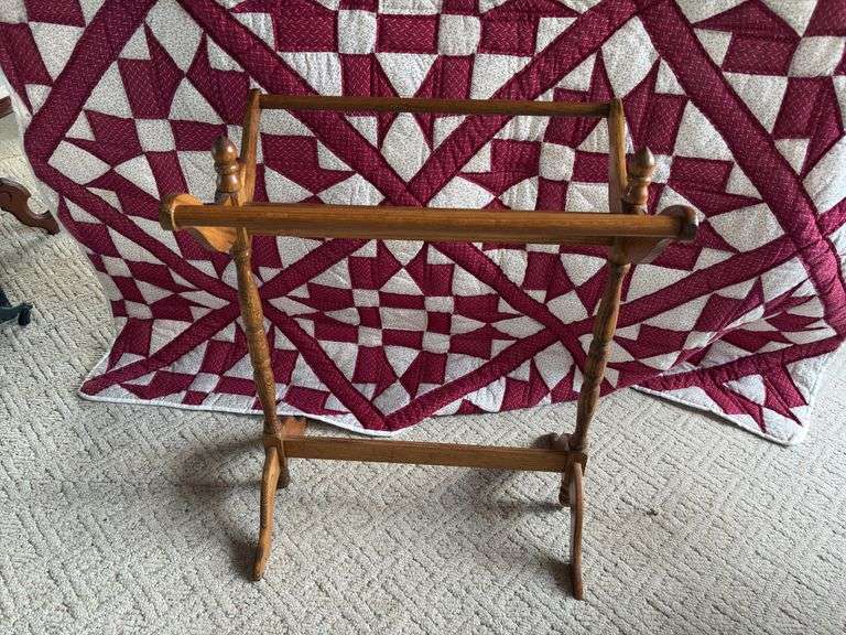 24" oak quilt stand and red and white quilt 72 x 88 image