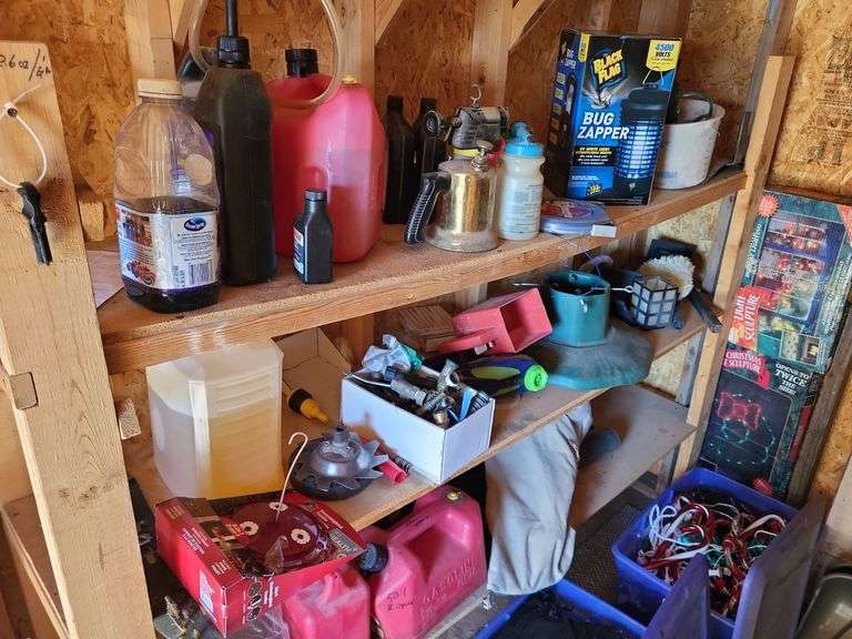 Gas cans, bug zapper, everything on shelves-Bring boxes to pack image