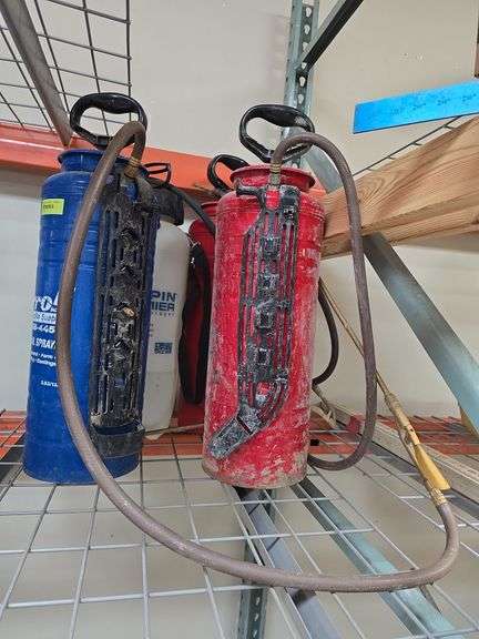 4 pump up sprayers used for form spray image