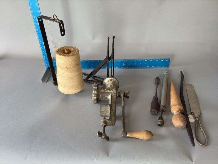 Vintage kitchen items include Griswold grinder, wall mount string holder, brackets, etc. image
