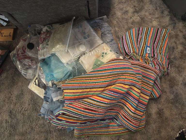 Two large Afghan blankets and additional linens some vintage image