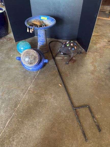 Small shepherd hook, wind chime, frog, small gazing balls, small bird bath and blue planter image