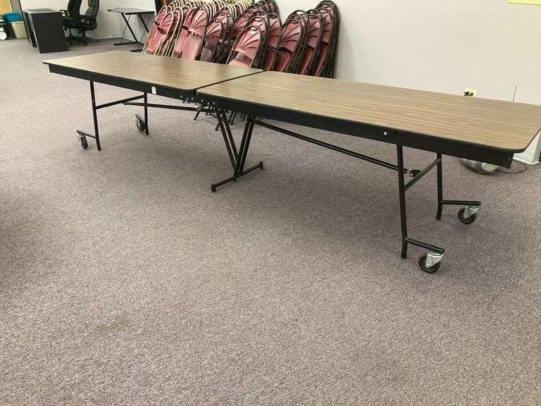 Folding table on rollers-each side 72x30 when down is 144” long image