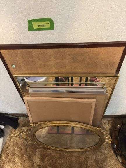 Wall mirror, cork boards, framed poster, etc