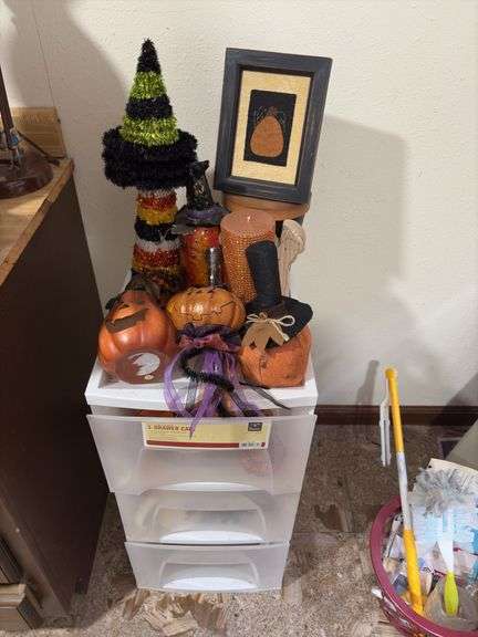 Storage drawer with pumpkin decor and holiday mugs image