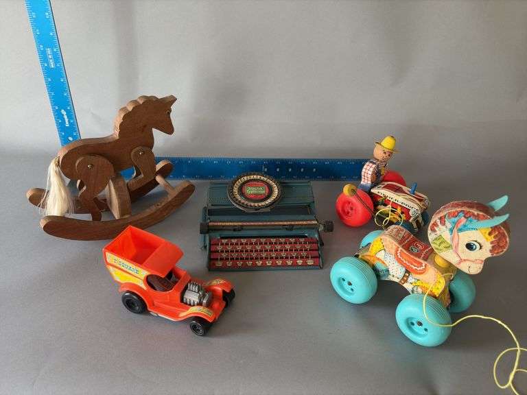 Vintage toys includes FP farmer 629, FP Patch Pony , simplex typewriter image