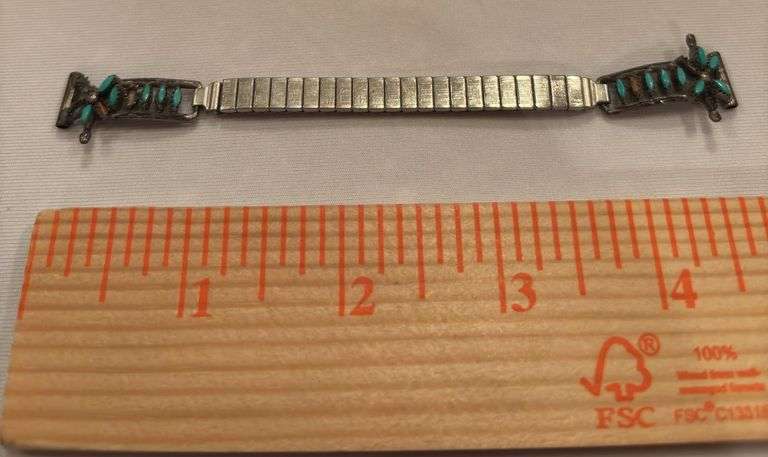 Turquoise watch band, unmarked, one flower is broken image